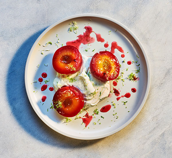 plate of roasted plums and vanilla yoghurt